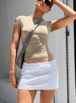 Princess Polly Valery Parachute Mini Skirt White -Princess Polly Sales Store 1 modelinfo Millie us4 f9a53196 2103 4b9a bbdf 6c4a847bc1dc